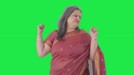 Lazy-Indian-old-woman-yawning-Green-screen