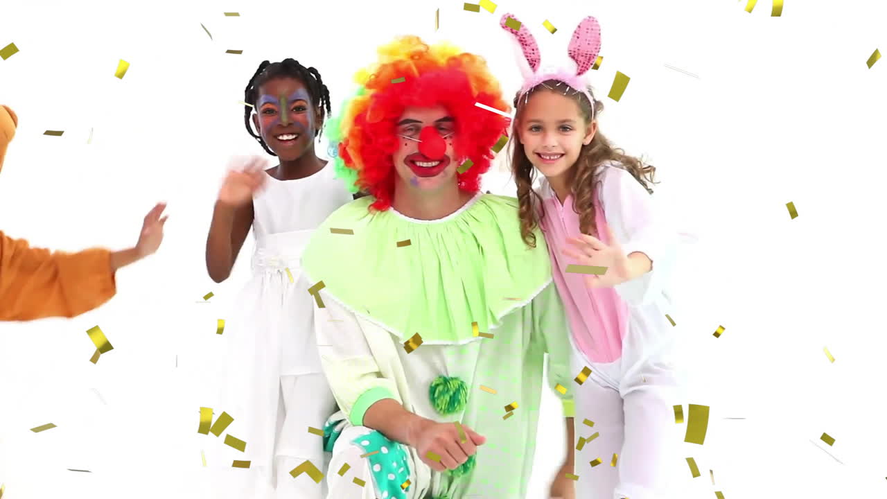 animación de confeti cayendo sobre niños y payaso celebrando en trajes coloridos