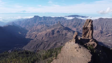 Flight-over-of-Roque-Nublo,-a-volcanic-rock-in-caldera-of-Tejeda,-Gran-Canaria,-Canary-islands,-Spain