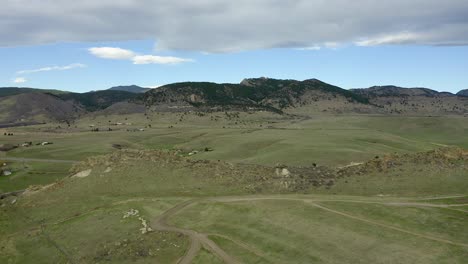 Aerial-wide-view-of-ridge-and-road