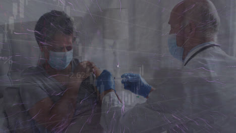 animation of data processing over caucasian male doctor with face mask vaccinating