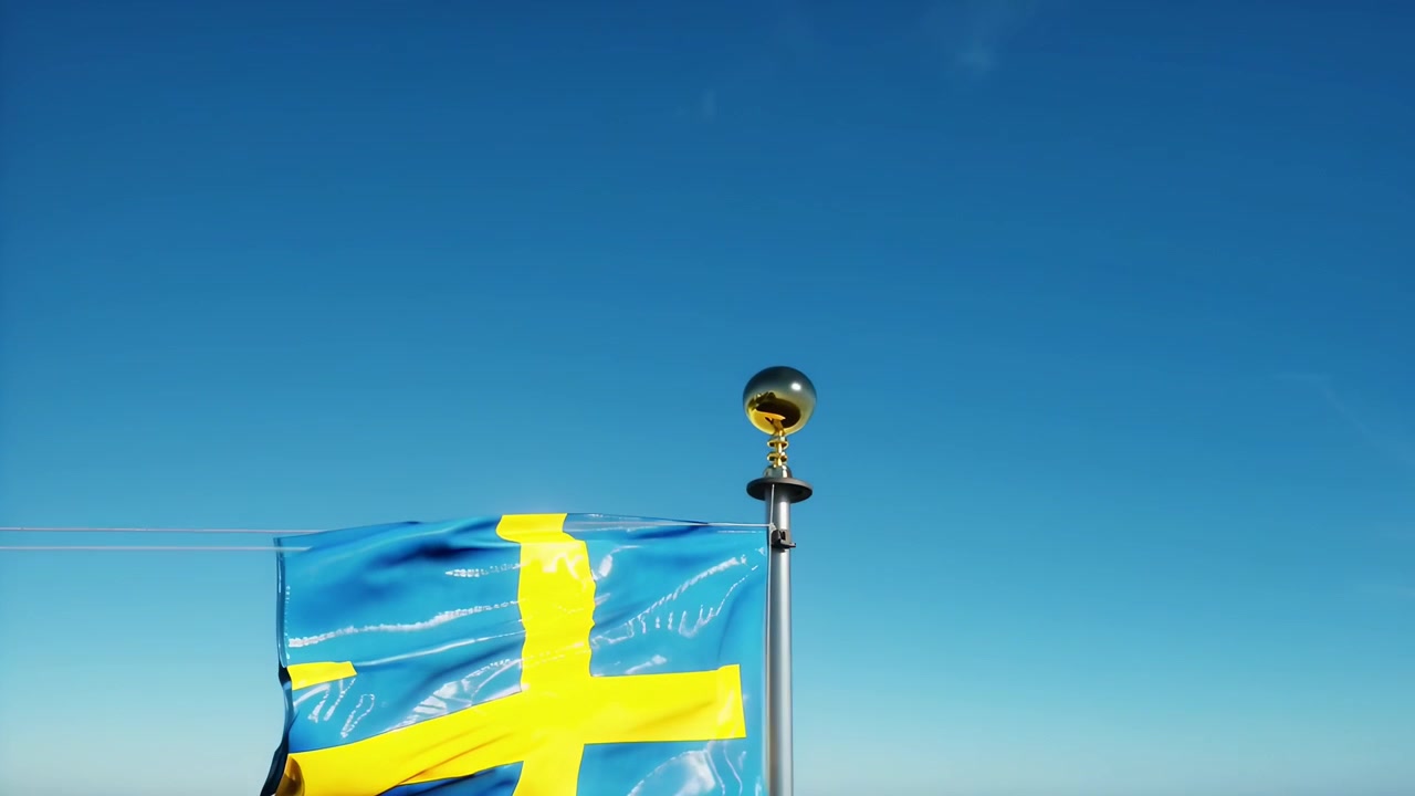 Ruotsin lippu liehuu tuulessa kirkasta sinistä taivasta vasten
