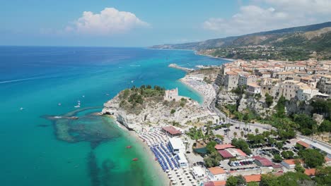 Tropea-Beaches-and-Coastal-Village-on-top-of-Cliffs-in-Calabria,-Italy---Aerial-4k