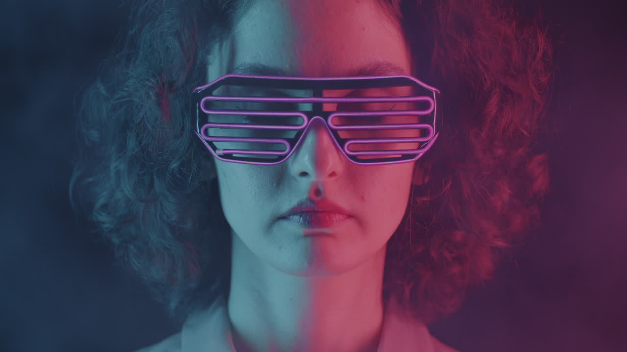 Woman in 80s Style Glasses with Neon Lighting