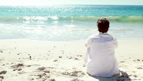 Man-relaxing-on-the-beach