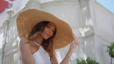 elegant woman straw hat posing beautiful summer closeup. portrait chic model