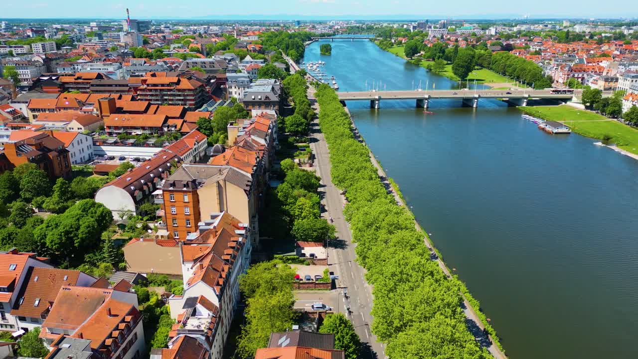 4K Aerial Drone Video of Historic Homes, Shops, and Churches along the Neckar River in Downtown Heidelberg, Germany