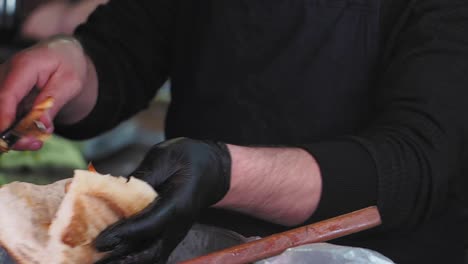 preparing a delicious street food sandwich