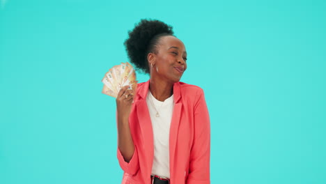 Black-woman,-winner-and-money-in-hand-in-studio
