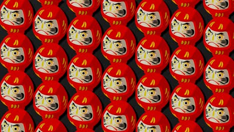 red daruma dolls on black background.