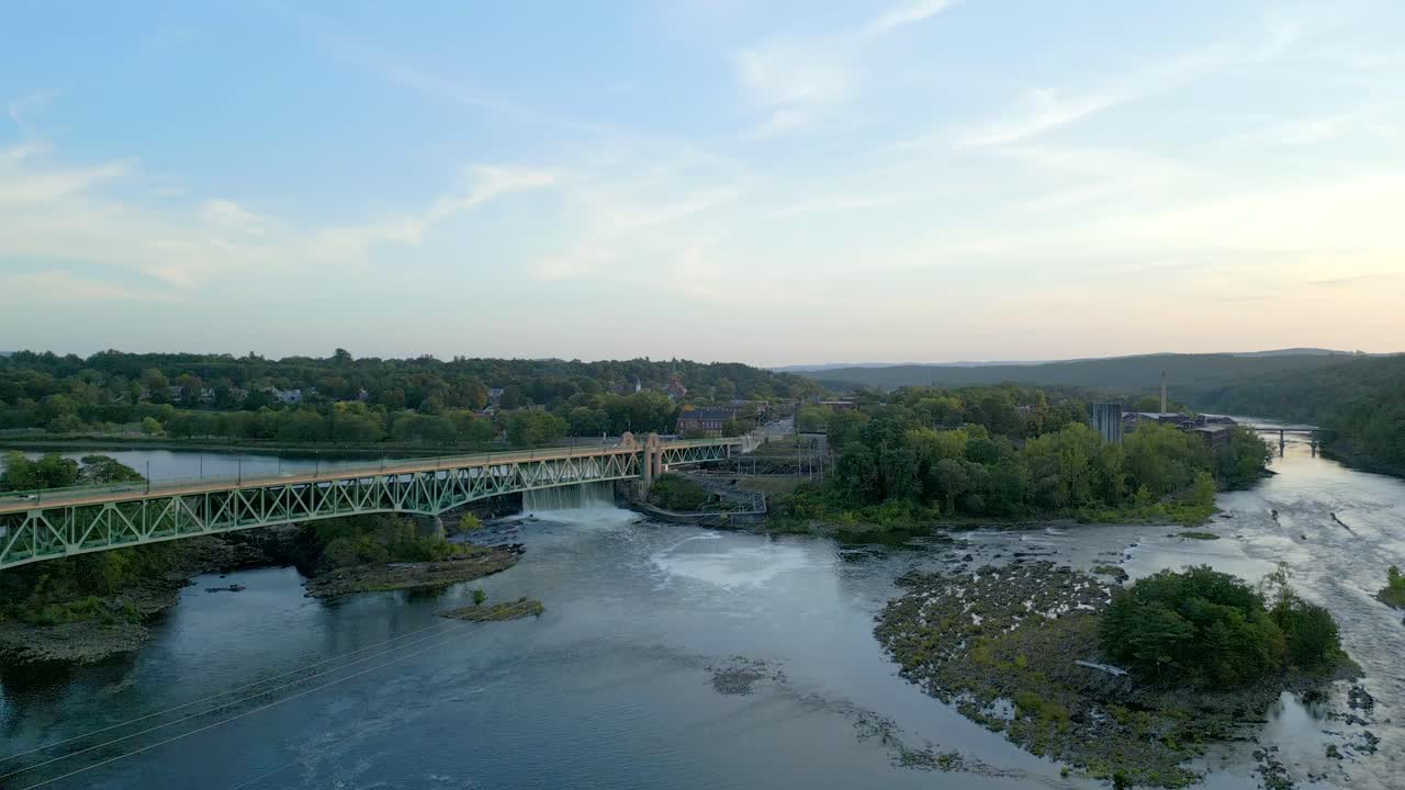 Aerial view of Turner Falls, lush landscape, tranquil river, evening serenity