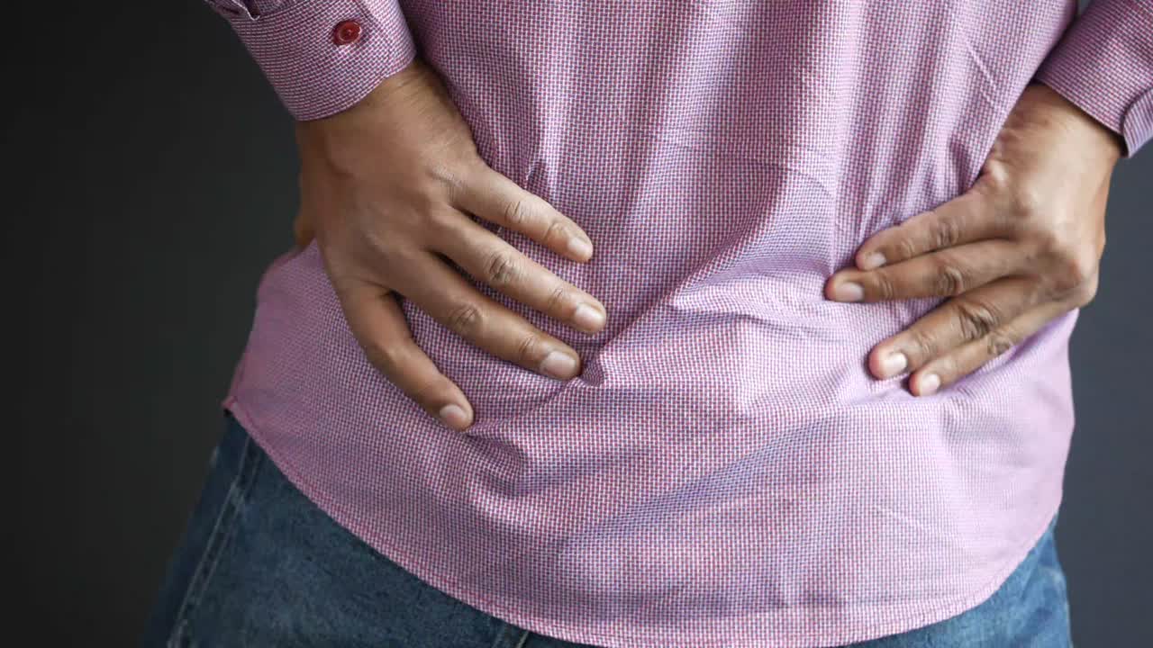 hombre con dolor de espalda