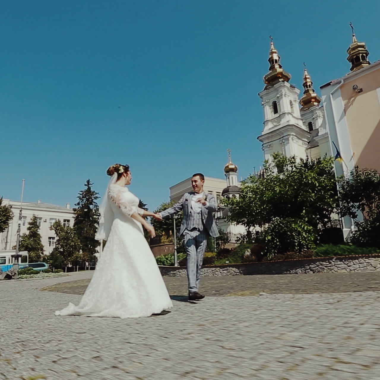 Just Married. Couple walking down the street on Wedding. Sunny Day. Square video