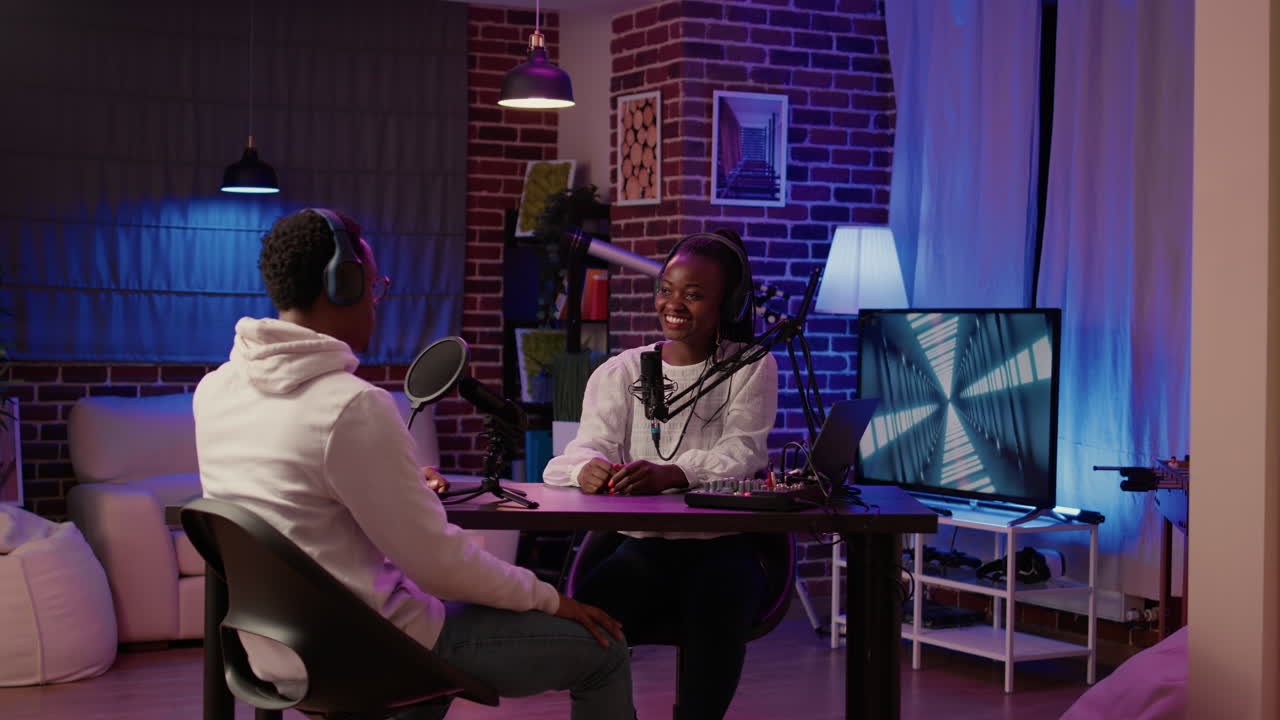 African american online radio host talking in interview with influencer for entertainment internet show