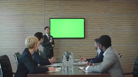 businessman presenting something at meeting