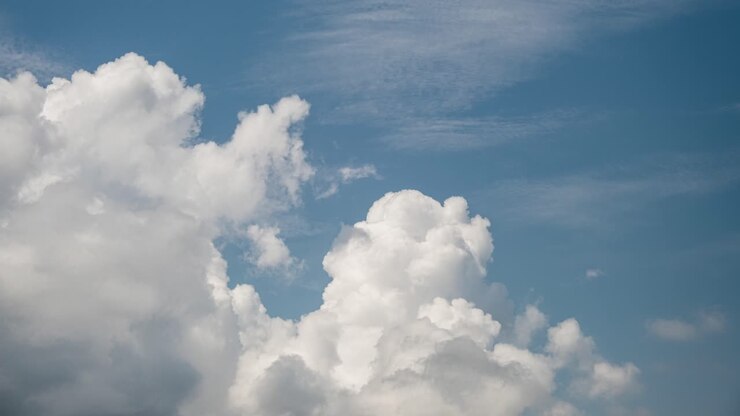Timelapse of Cumulus and Cirrus Clouds Forming in Blue Skies