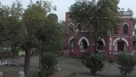 Drone-shot-of-an-old-building-in-Kervada-village,-Gujarat,-India