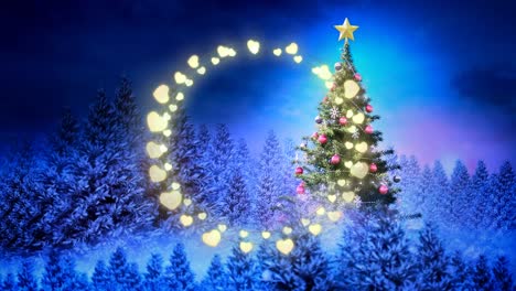 Yellow-glowing-heart-shaped-fairy-lights-against-christmas-tree-on-winter-landscape