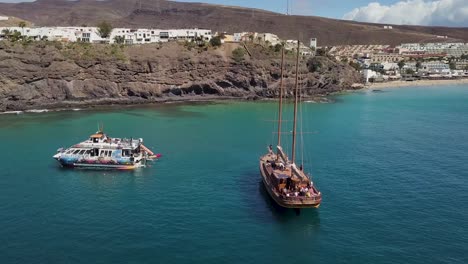 wooden boat sailboat yacth in fuerteventura coastline spain canary island travel holiday destination in europe