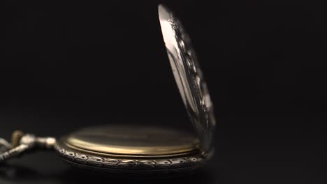 antique pocket watch with detailed engraving