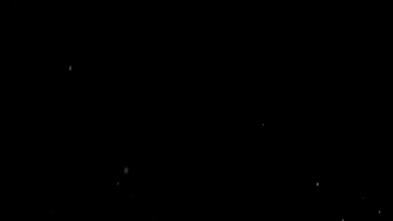 검은 바탕에 물이 어지고 있습니다.