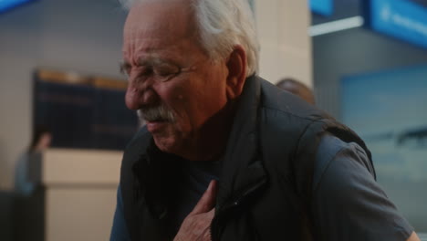 elderly man in distress in hospital waiting room