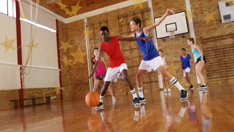 playing basketball in gym, players dribbling and defending, star animation over scene