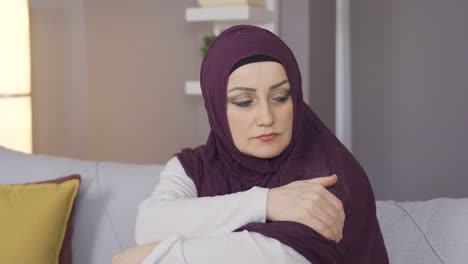 muslim woman in hijab is depressed and unhappy.