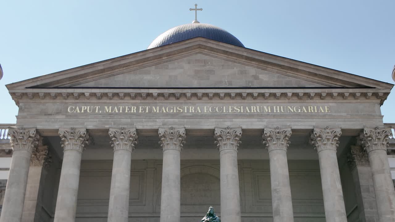Exterior view of a church with a statue