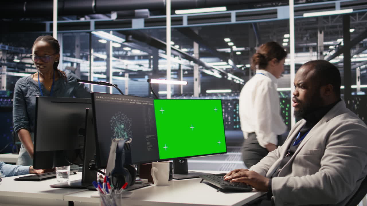 Vertical video Data center admin using isolated screen PC to monitor neural network AI