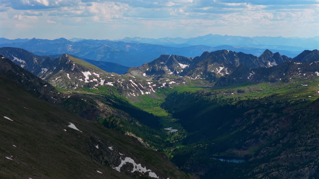 Elk Mountains range Maroon Bells Capitol Peak Mount Snowmass Castle Conundrum Peak spring summer Colorado aerial drone Rocky Mountains valley Sawatch Range Mount of the Holy Cross 14er landscape right