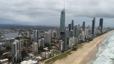 Surfers-Paradise,-Gold-Coast,-Queensland,-City-Coastline,-Waterfront-Towers-and-Beach,-Drone-Shot