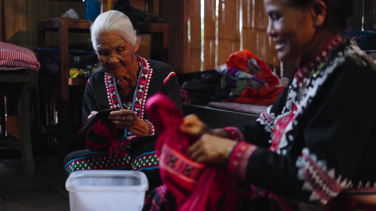 Elderly women practicing traditional textile crafts
