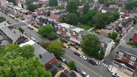zoom in aerial shot of townhomes in a