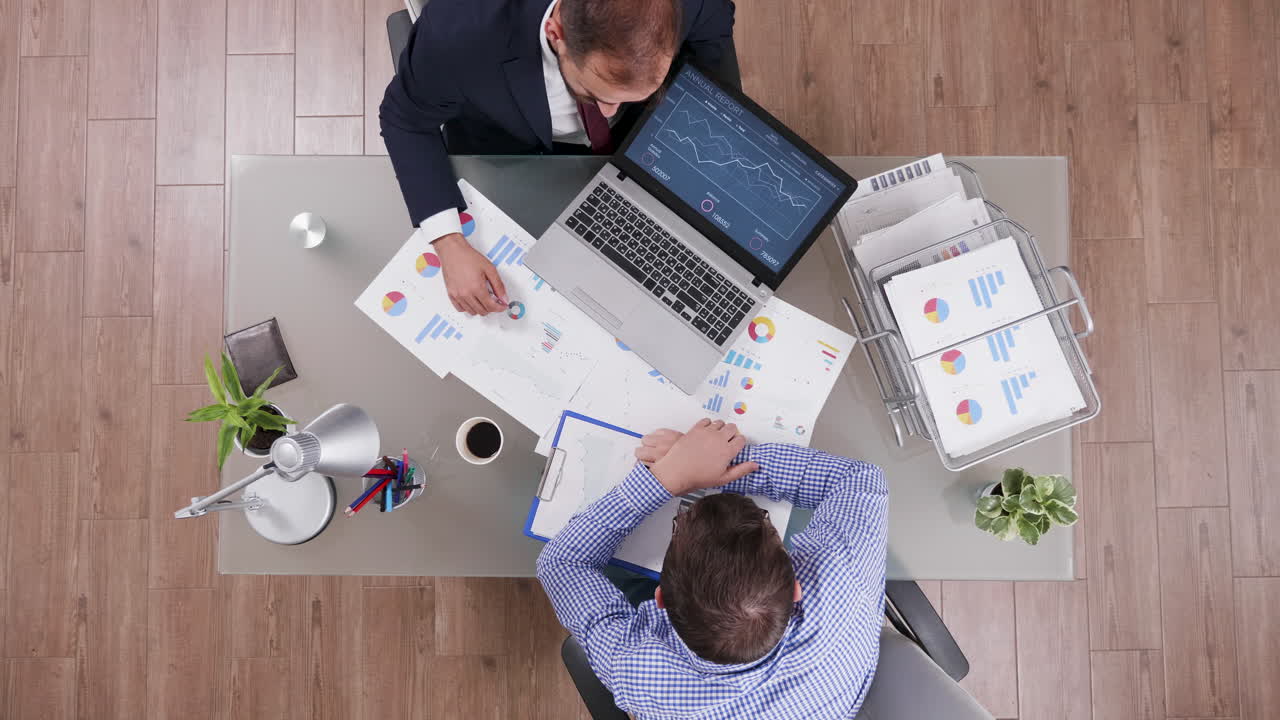 Business meeting with analytics report