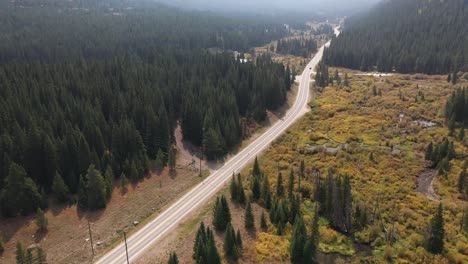 Drone-Aerial-View-of-Countryside-Road-in-Rural-Colorado-USA-on-Sunny-Autumn-Day