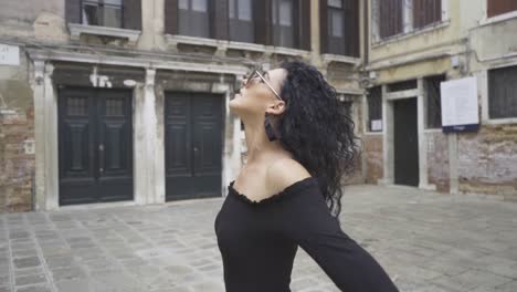 Beautiful-woman-spinning-inside-palace-courtyard-slow-motion