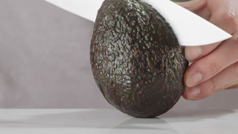 cutting an avocado in half