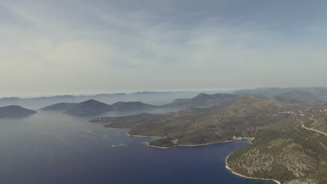 Flight-over-desert-islands-and-colorful-sea,-Brijuni-park,-Croatia