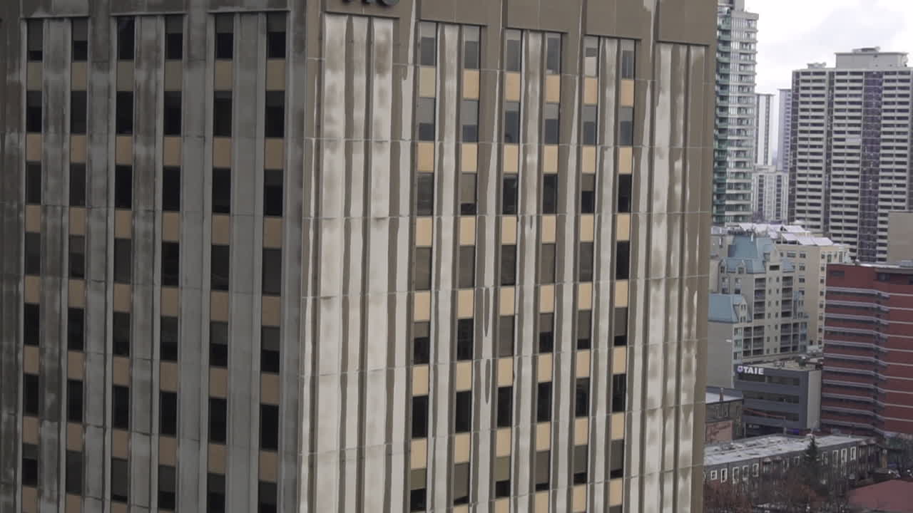 Downtown non descript city. day exterior 4k Close up on building