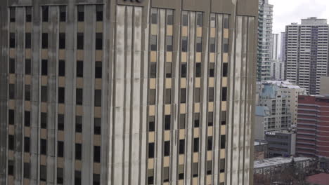 downtown non descript city. day exterior 4k close up on building