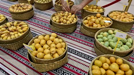 different varieties of fresh emirati dates are displayed during the dates festival in the united arab emirates