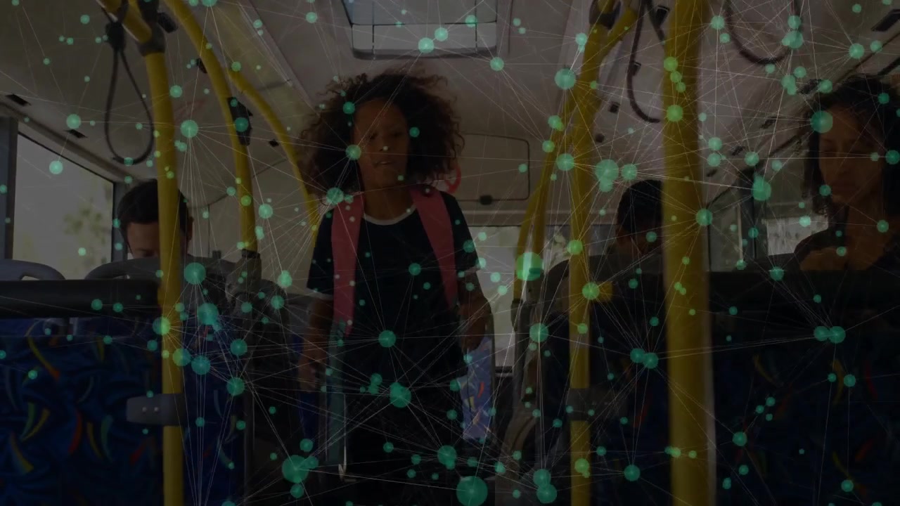 Entering bus teen girl walking aisle gripping rail while transit overlay mapping path to front