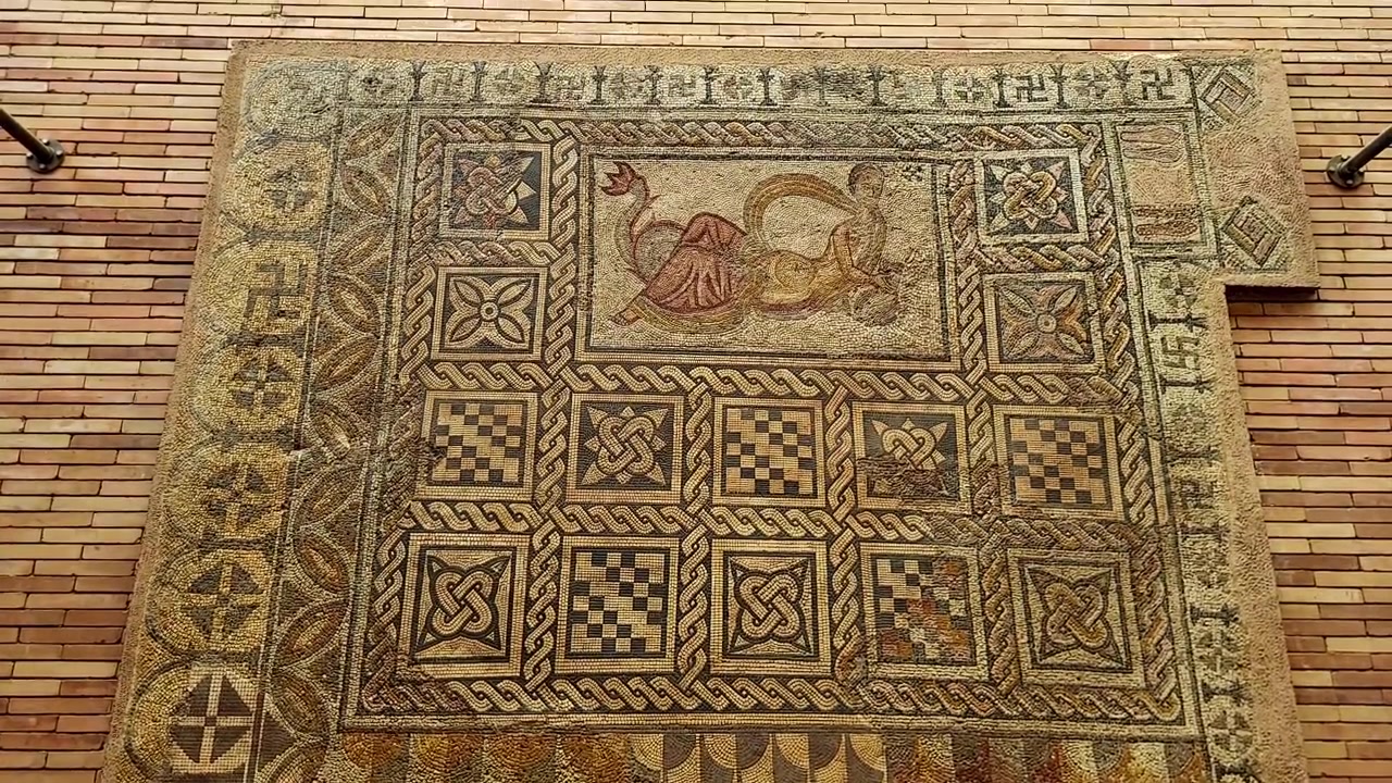 Roman mosaic made with stone and marble tesserae. Roman art for decorating the floors of Roman villas. Image of the myth of the sirens of ancient Rome. Mérida. Spain.