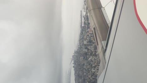 looking through window aircraft during flight in the wing with a nice blue sky