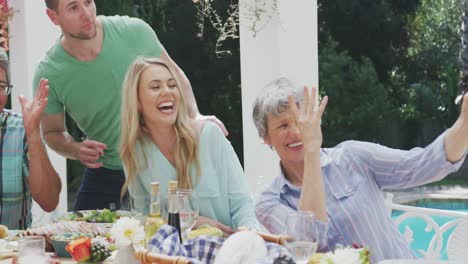 Happy-family-eating-together-at-table