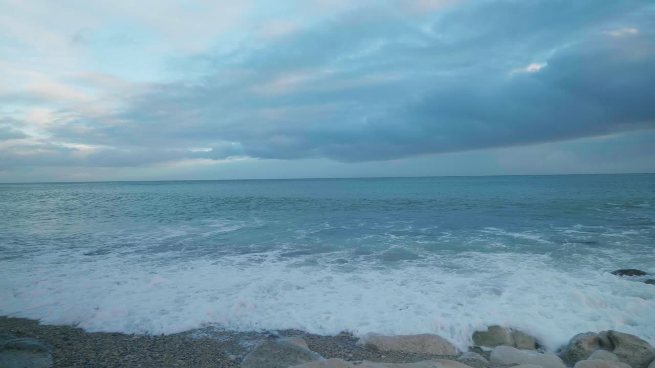 4K Cinematic landscape shot of the beach of Church Ope, Portland, during sunset.