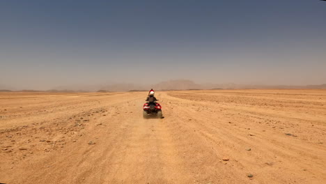 quad bikes driving at safari desert in hurghada, egypt, off road trip, sandy terrain, horizon view, extreme sports, 60 fps