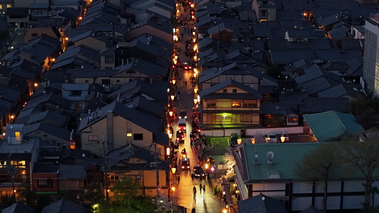 Aerial drone view of the Hanamikoji Street in Kyoto, Japan in the evening