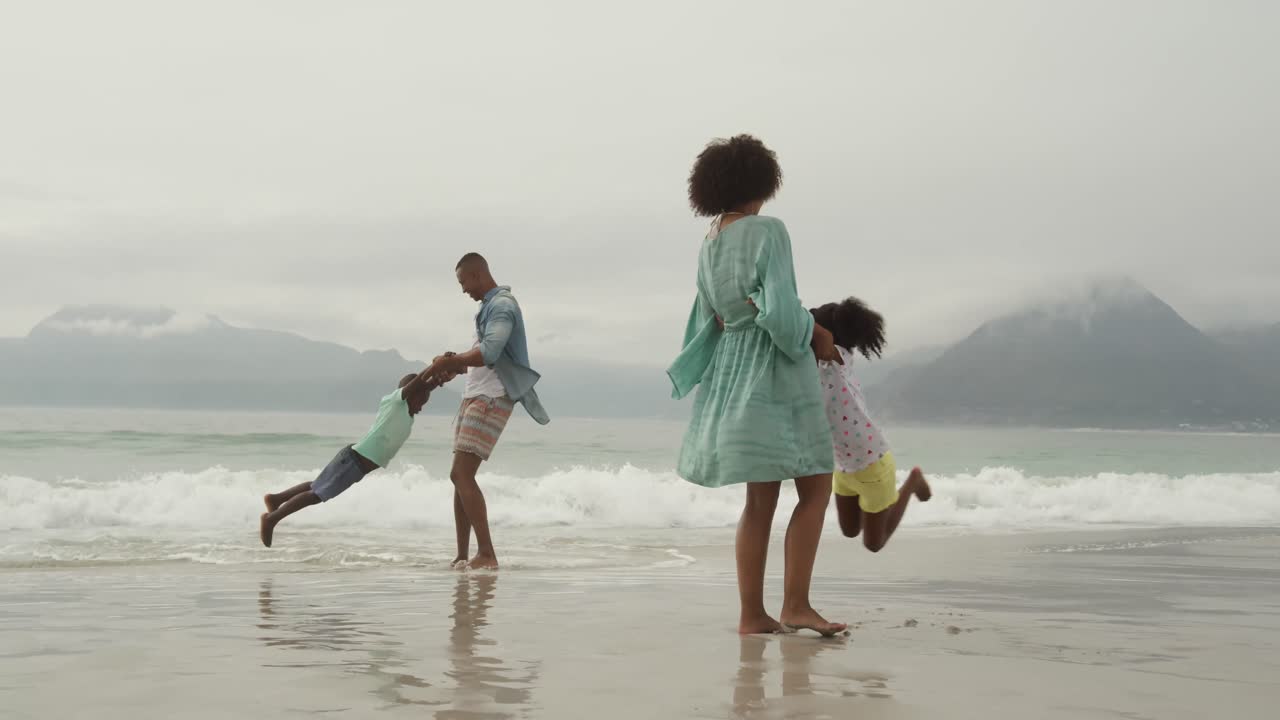 Family enjoying free time by the sea